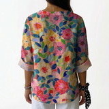 Gabriela | Blusa Floral Vibrante com Detalhe de Botão