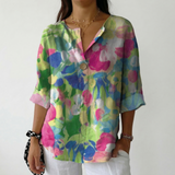 Gabriela | Blusa Floral Vibrante com Detalhe de Botão