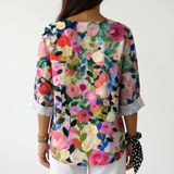 Gabriela | Blusa Floral Vibrante com Detalhe de Botão
